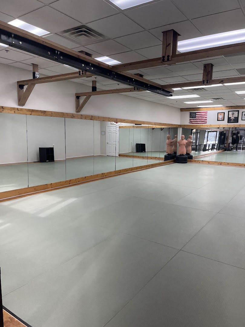 Open matted training area with the heavy bags moved out of the way
